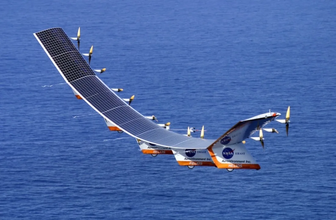 A solar-powered aircraft with photovoltaic cells covering its wing.